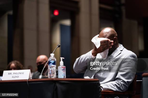 Philonise Floyd, brother of George Floyd, tears up while testifying during a House Judiciary Committee at a hearing on police accountability on...