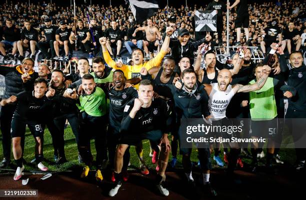 Partizan players celebrate after winning the Serbian Cup Semi Final match between FK Partizan and FK Crvena Zvezda on June 10, 2020 in Belgrade,...
