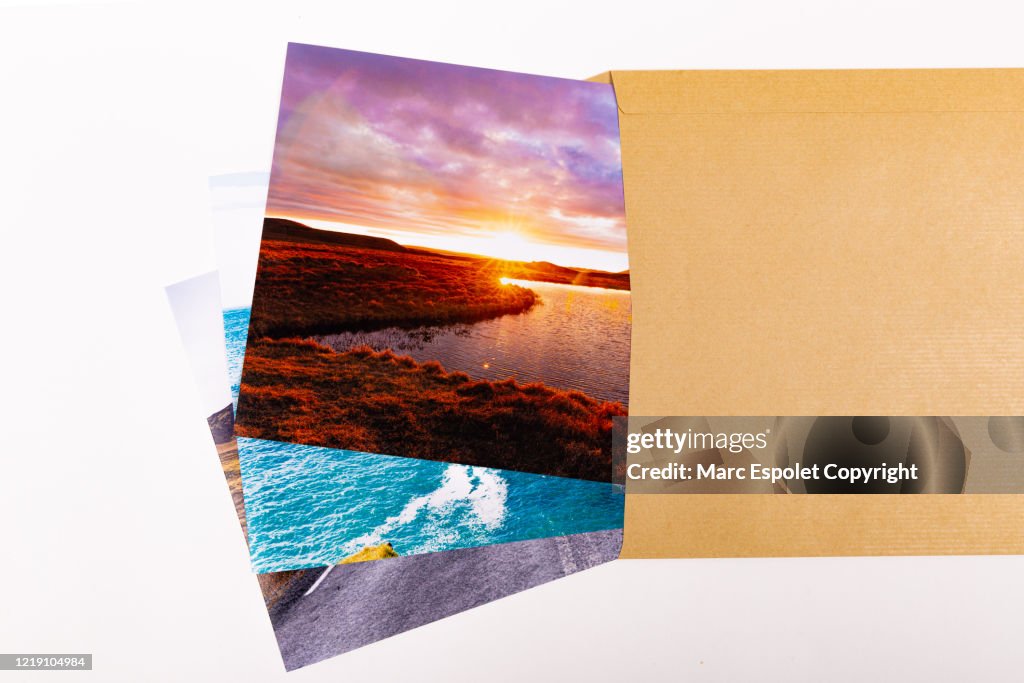Brown envelope with landscape photo