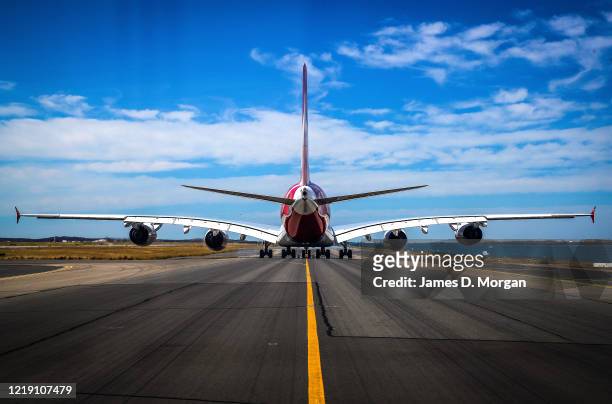 Qantas and Virgin Australia planes at Kingsford Smith International airport on November 15, 2019 in Sydney, Australia.