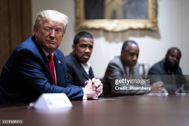 President Donald Trump sits during a meeting with African-American supporters in the Cabinet Room of the White House in Washington, D.C., U.S., on...