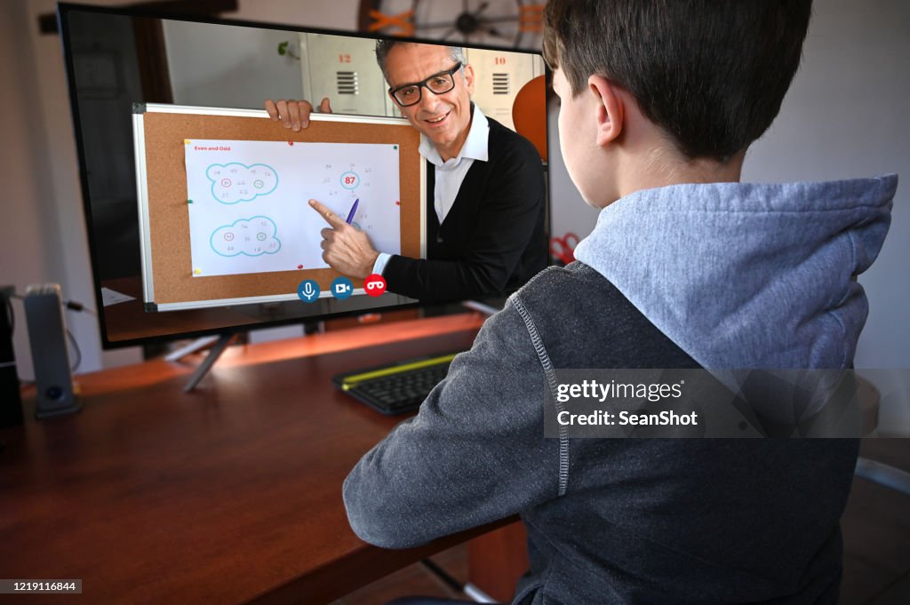 Teacher Video Chatting with a Child