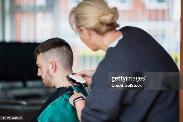 shaving his neck - lockdown haircut stock pictures, royalty-free photos & images