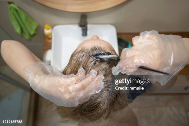 hair care at home - hair dye stock pictures, royalty-free photos & images