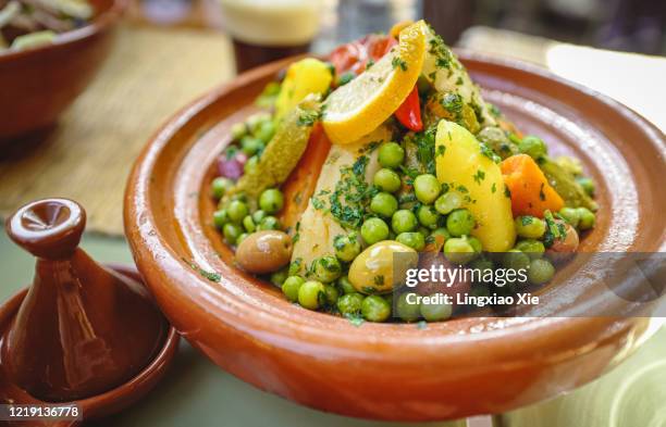 close-up view of various vegetables cooked in famous moroccan tajine, morocco - tajine stock pictures, royalty-free photos & images