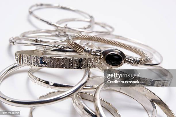 bangles - bracelet stockfoto's en -beelden