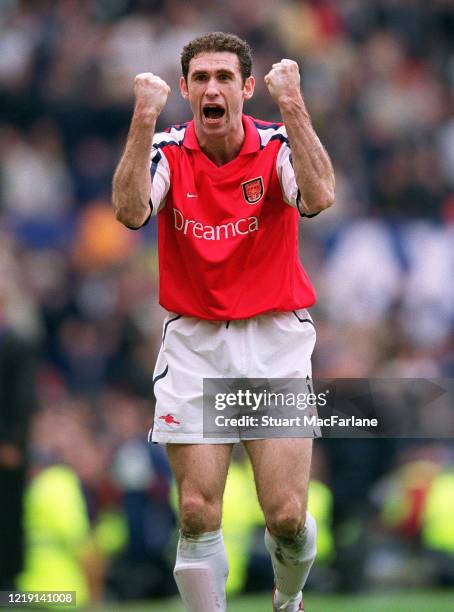 Martin Keown of Arsenal celebrates after the FA Cup semi final match between Arsenal and Tottenham Hotspur on April 8, 2002 in Manchester, England.
