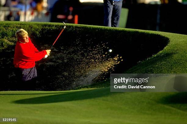 John Daly of the USA plays out of the Road-Hole bunker during the Alfred Dunhill Cup at St Andrews Golf Club in Fife, Scotland. \ Mandatory Credit:...