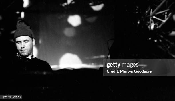 Alex Patesron of The Orb performs on stage, United Kingdom, 1992.