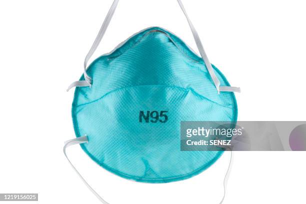 blue n95 medical mask - flu mask stock-fotos und bilder