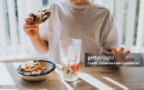 cookies and milk - child cookie jar stockfoto's en -beelden