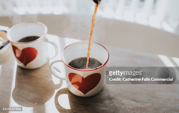 coffee cups - valentines day couple stock pictures, royalty-free photos & images