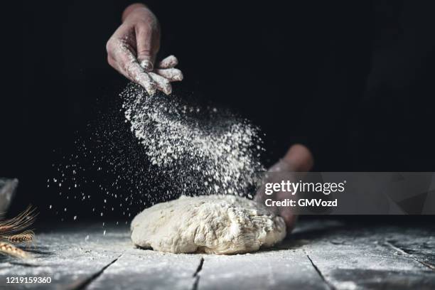 kneading bread dough with hands - pão imagens e fotografias de stock