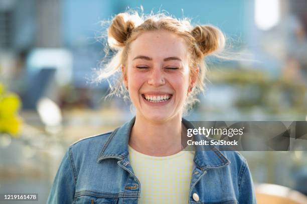 loving life - hair bun stock pictures, royalty-free photos & images