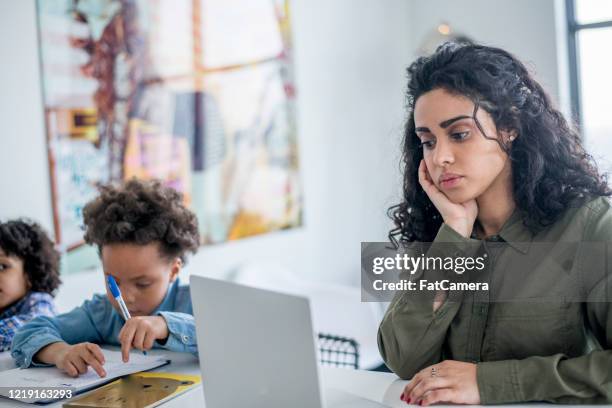 mother working from home - single mother stress stock pictures, royalty-free photos & images