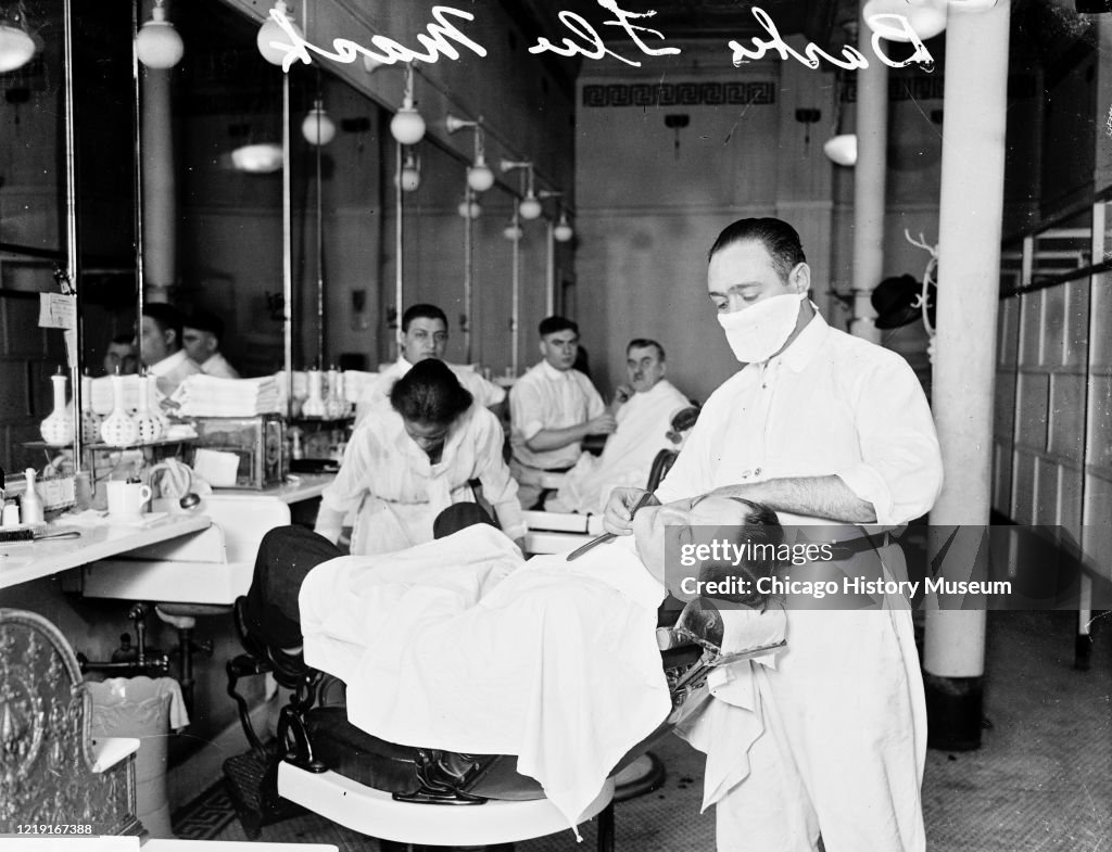 Barber, Wearing An Influenza Mask, Shaving A Man's Face
