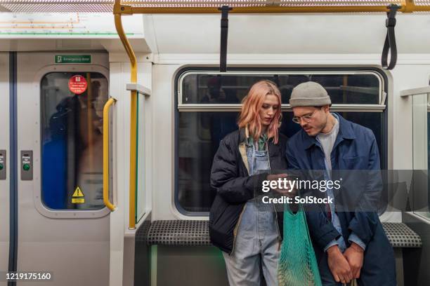 riding the subway - underground train stock pictures, royalty-free photos & images