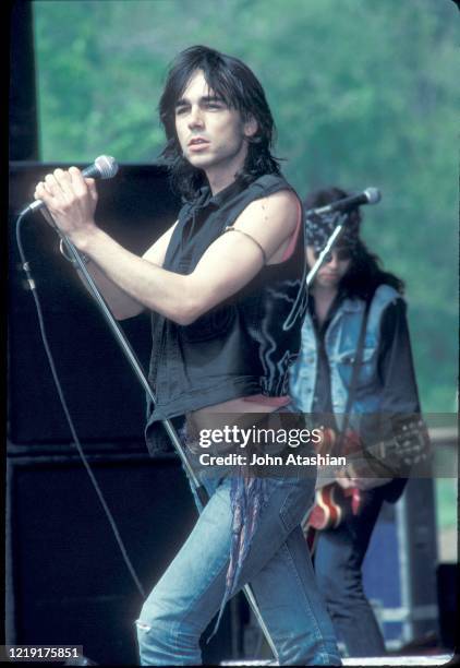 Singer Chris Barry is shown performing on stage during "live" concert appearance with 39 Steps on May 12,1990.