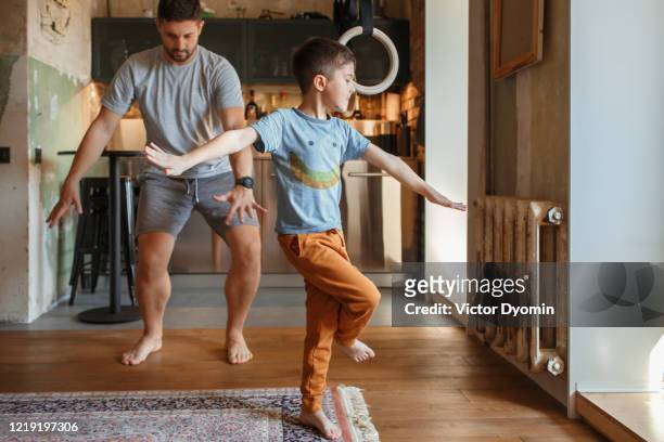 a father with a little son having fun together - tipo di danza foto e immagini stock