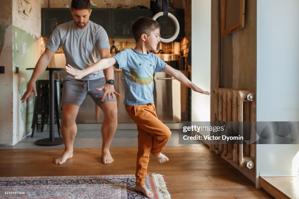 A father with a little son having fun together