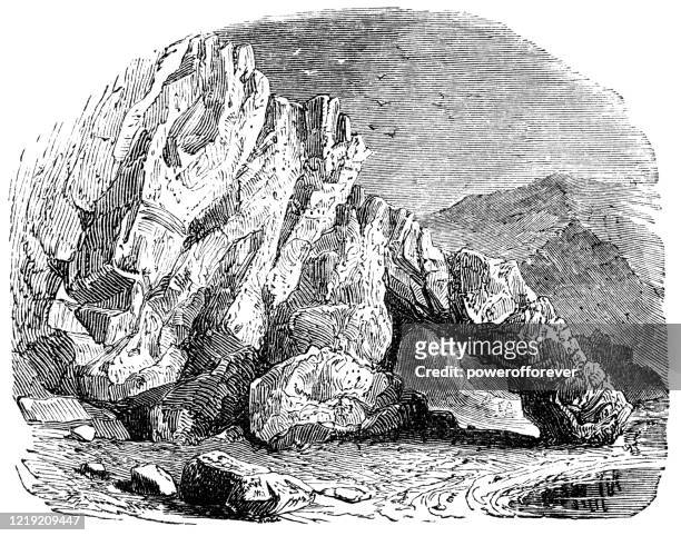 ilustrações de stock, clip art, desenhos animados e ícones de rock formations at kynance cove in cornwall, england - 19th century - lizard