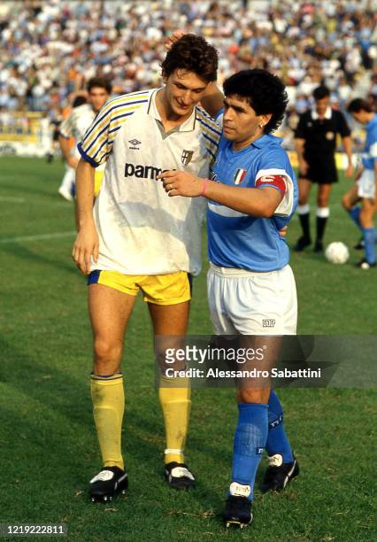 Lorenzo Minotti of Parma Calcio exchanges the shirt with Diego Armando Maradona of SSC Napoli after the Serie A match between SSC Napoli and Parma...