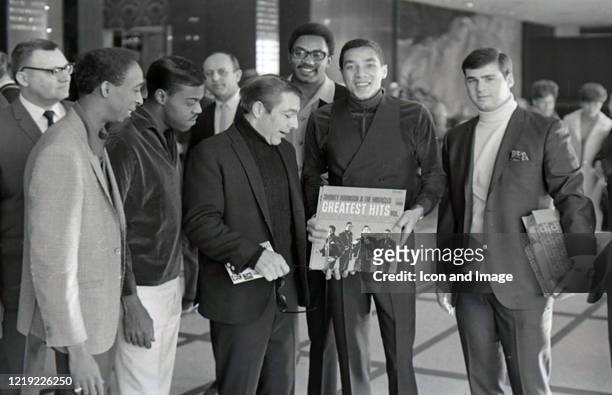 American singer, songwriter and record producer Smokey Robinson with Ronnie White , Bobby Rogers and Pete Moore , collectively known as The Miracles,...