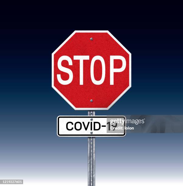 covid-19 placard with stop traffic sign - stop sign post vector stock illustrations