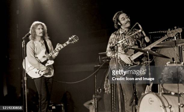 American rhythm guitarist Tom Fogerty and American bass guitarist Stu Cook, both founding members of Creedence Clearwater Revival, play with the band...