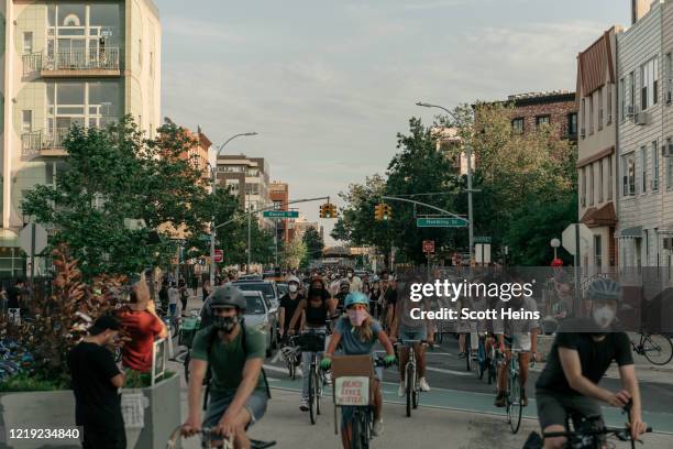 Cyclists gather for a mass ride in protest of systemic racism in policing and the May 25th killing of George Floyd by a Minneapolis Police Department...