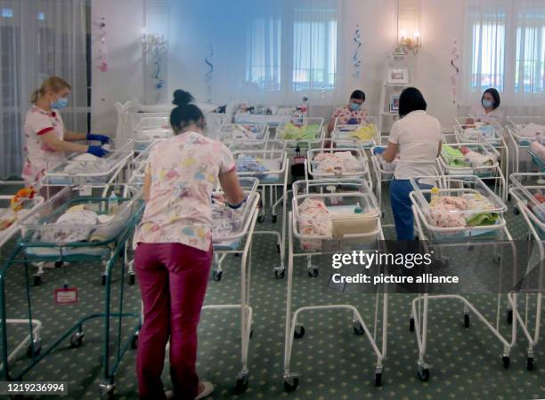 June 2020, Ukraine, Kiew: In a hotel on the outskirts of the city, dozens of surrogate babies have been waiting to be picked up by their foreign...