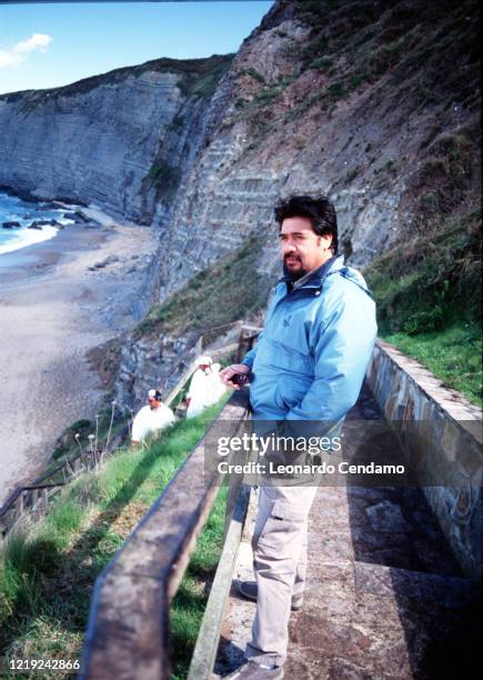 Chilean writer Luis Sepulveda near cliffs, Gijon, 11th April 2003. Photo by Leonardo Cendamo / Getty Images