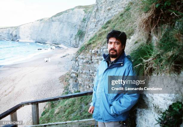 Chilean writer Luis Sepulveda near cliffs, Gijon, 11th April 2003.