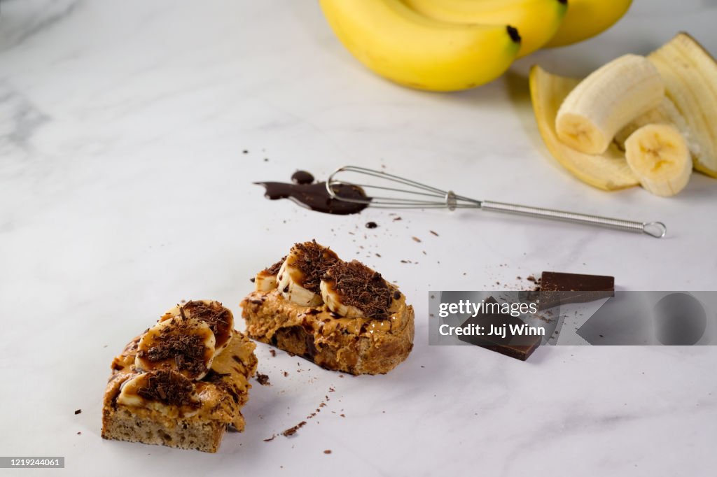 Nut butter on toast with bananas and chocolate