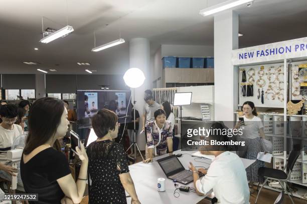Employees rehearse hosting a livestream session for the upcoming Canton Fair inside a showroom at Ningbo MH Industry Co. In Ningbo, Zhejiang...