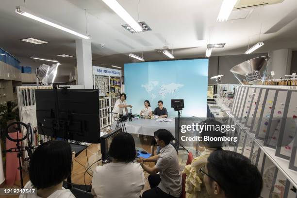 Employees rehearse hosting a livestream session for the upcoming Canton Fair inside a showroom at Ningbo MH Industry Co. In Ningbo, Zhejiang...