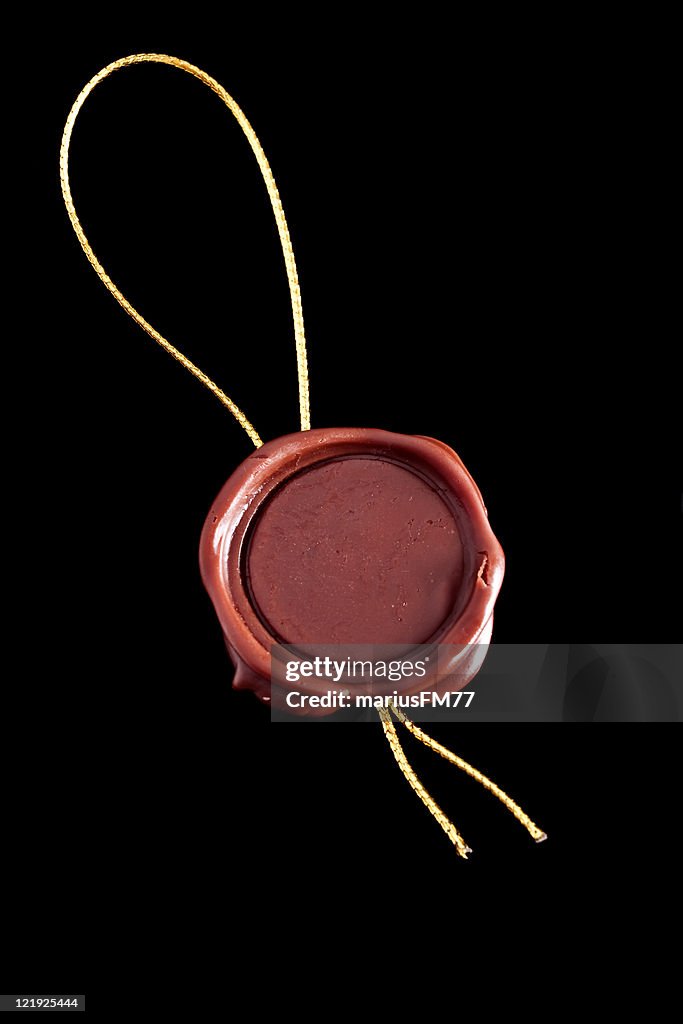 Close up of real wax seal on black background