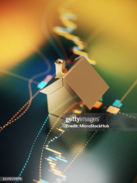 house symbol sitting over a bar graph - stock market and real estate concept - new housing development sign stock pictures, royalty-free photos & images