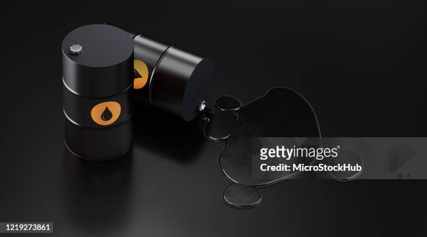 黒背景にオイルドラムとオイル流出 - 石油産業コンセプト - oil barrels ストックフォトと画像