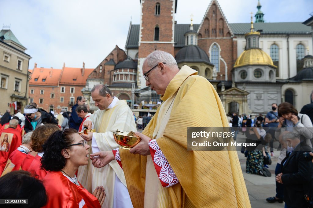 Controversial Archbishop Leads Corpus Christi Procession Despite Spike In Covid-19 Cases