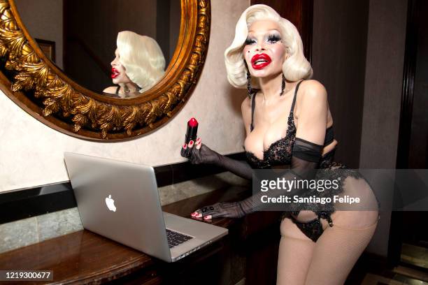 New York night life icon Amanda Lepore poses for photos while hosting Susanne Bartsch's 'ONTOP' ONLINE via ZOOM on April 16, 2020 in New York City.