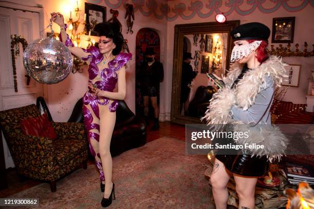 Susanne Bartsch and Caroline Caldwell do a twirl at home while hosting Susanne Bartsch's 'ONTOP' ONLINE via ZOOM on April 16, 2020 in New York City.