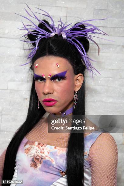 Mateo Alexander Palacio poses for photos while he hosts Susanne Bartsch's 'ONTOP' ONLINE at home via ZOOM on April 16, 2020 in New York City.