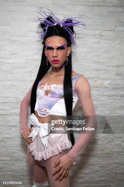 Mateo Alexander Palacio poses for photos while he hosts Susanne Bartsch's 'ONTOP' ONLINE at home via ZOOM on April 16, 2020 in New York City.