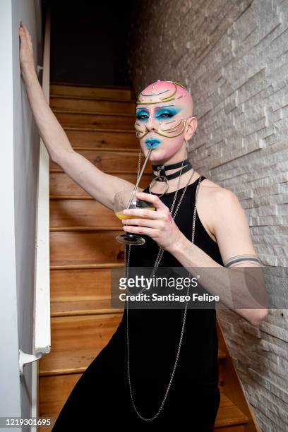 Ryan Burke poses for photos while he hosts Susanne Bartsch's 'ONTOP' ONLINE at home via ZOOM on April 16, 2020 in New York City.