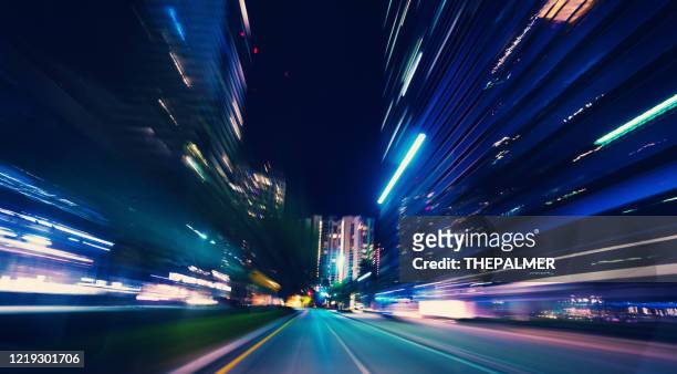 driving on the road urban lights - avenue stock pictures, royalty-free photos & images