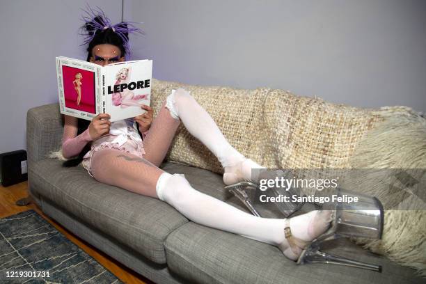 Mateo Alexander Palacio poses for photos while he hosts Susanne Bartsch's 'ONTOP' ONLINE at home via ZOOM on April 16, 2020 in New York City.