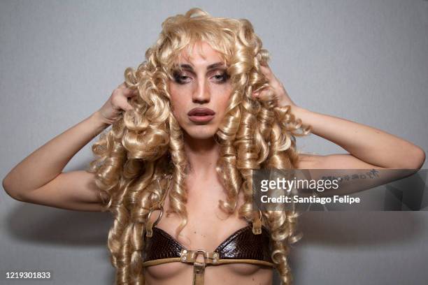Poses for photos while she hosts Susanne Bartsch's 'ONTOP' ONLINE at home via ZOOM on April 16, 2020 in New York City.