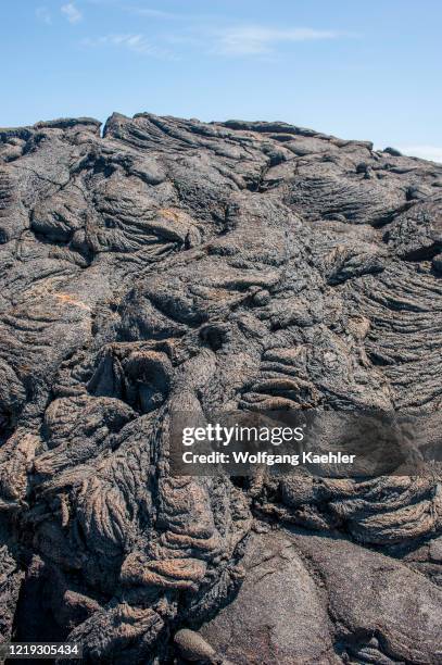Pahoehoe lava, also called rope lava, on Fernandina Island in the Galapagos Islands, Ecuador.