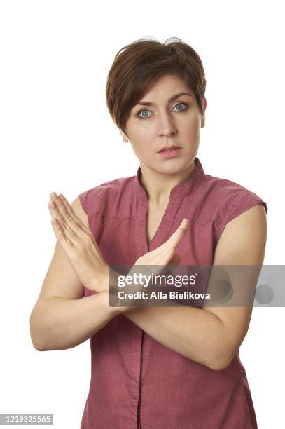 woman with crossed arms. - woman hand crossed stockfoto's en -beelden